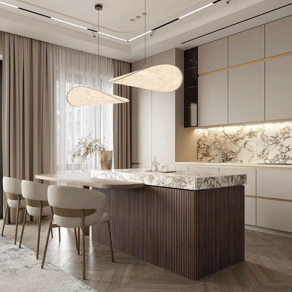 Japandi fabric wave korta chandelier adding soft organic texture to a contemporary marble kitchen and dining area