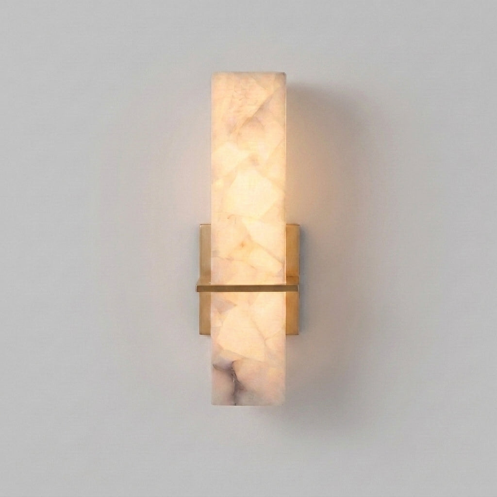 Kuvri white alabaster and gold metal wall lamp, angled studio shot