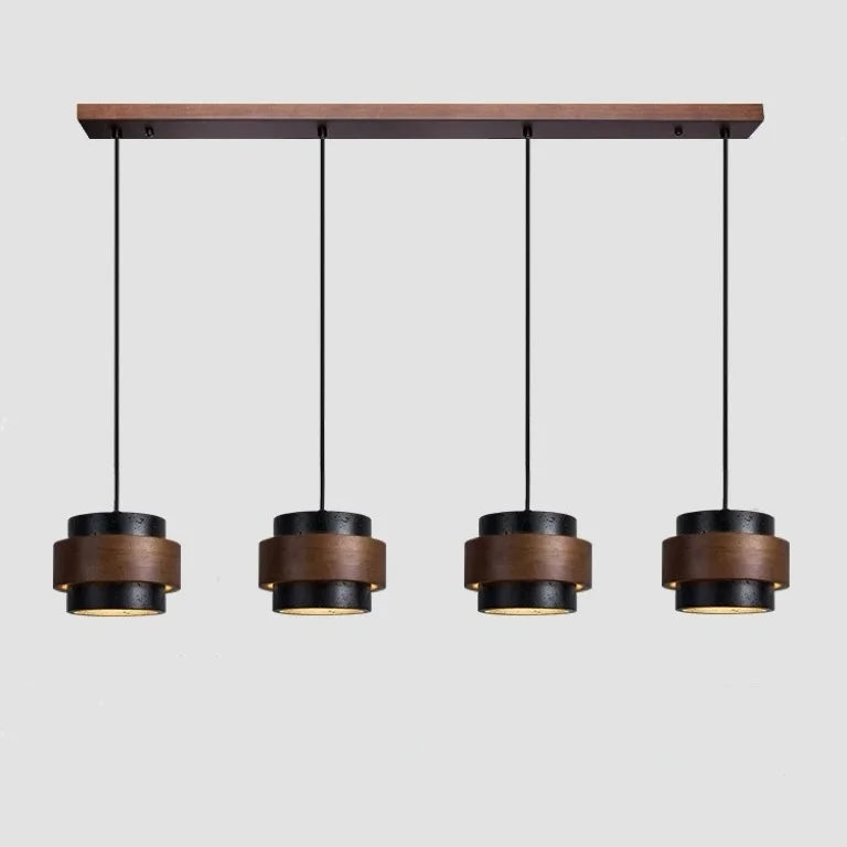 4-head black band travertine linear kyra pendant light isolated on a light grey background
