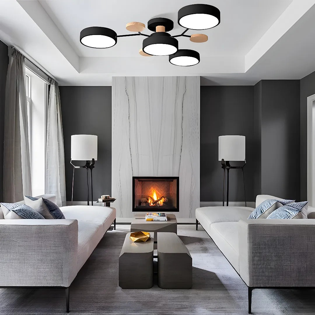 Black lasve 4-light multi-arm ceiling light acting as a striking centrepiece in a stylish lounge area.