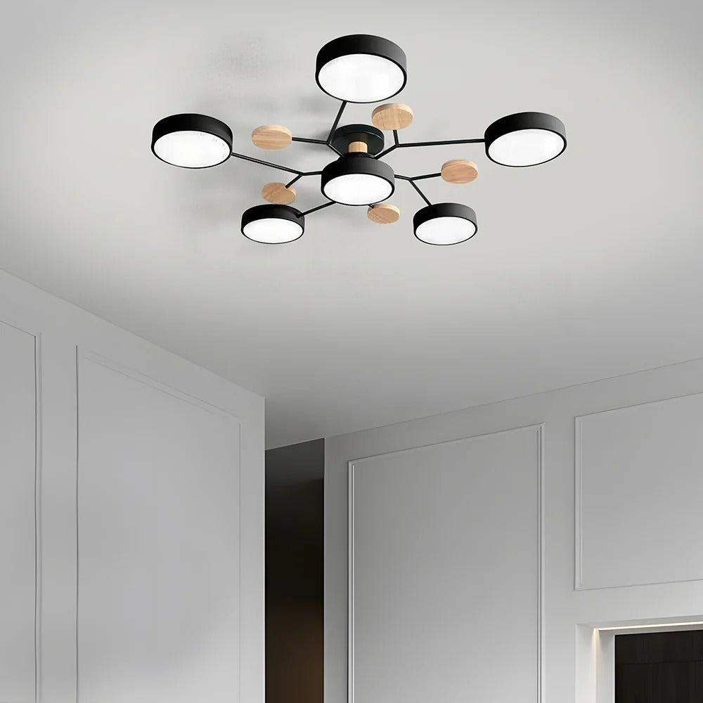 Isolated view of the large lasve black 6-light semi-flush chandelier showcasing its low 14cm profile