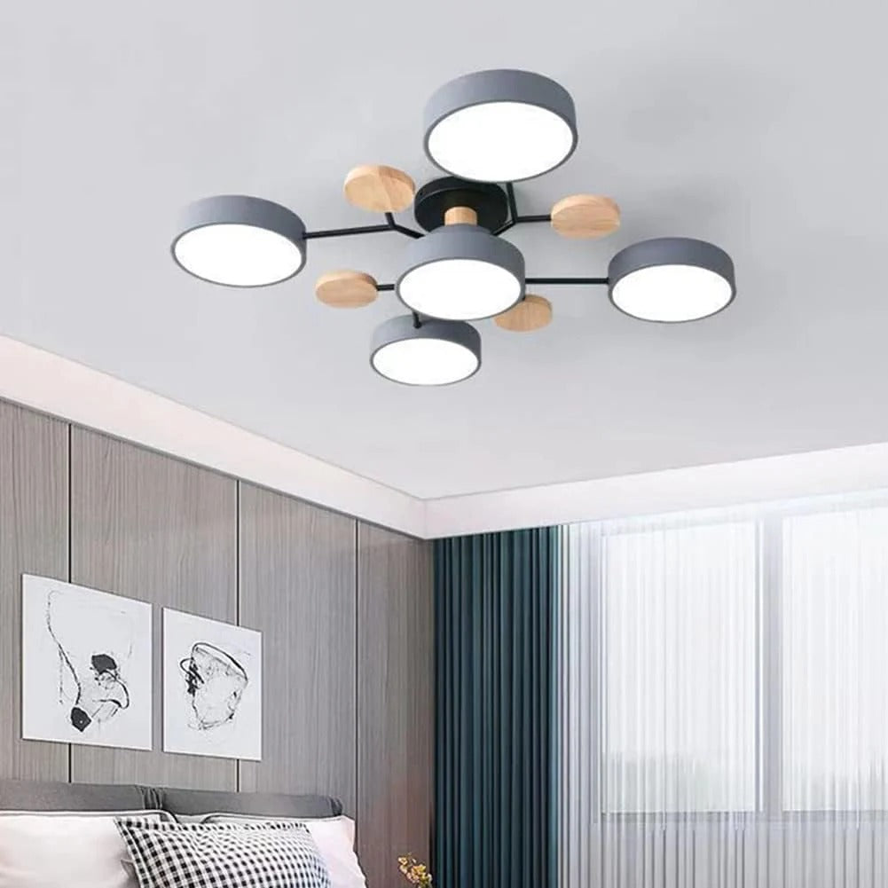 Grey 5-light LED lasve ceiling light completing the modern decor of a neutral-toned bedroom