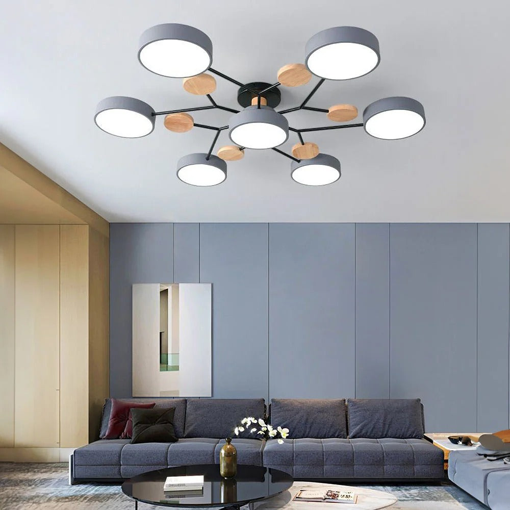 Crisp grey lasve 7-light Nordic branch ceiling light illuminating a bright, contemporary living room