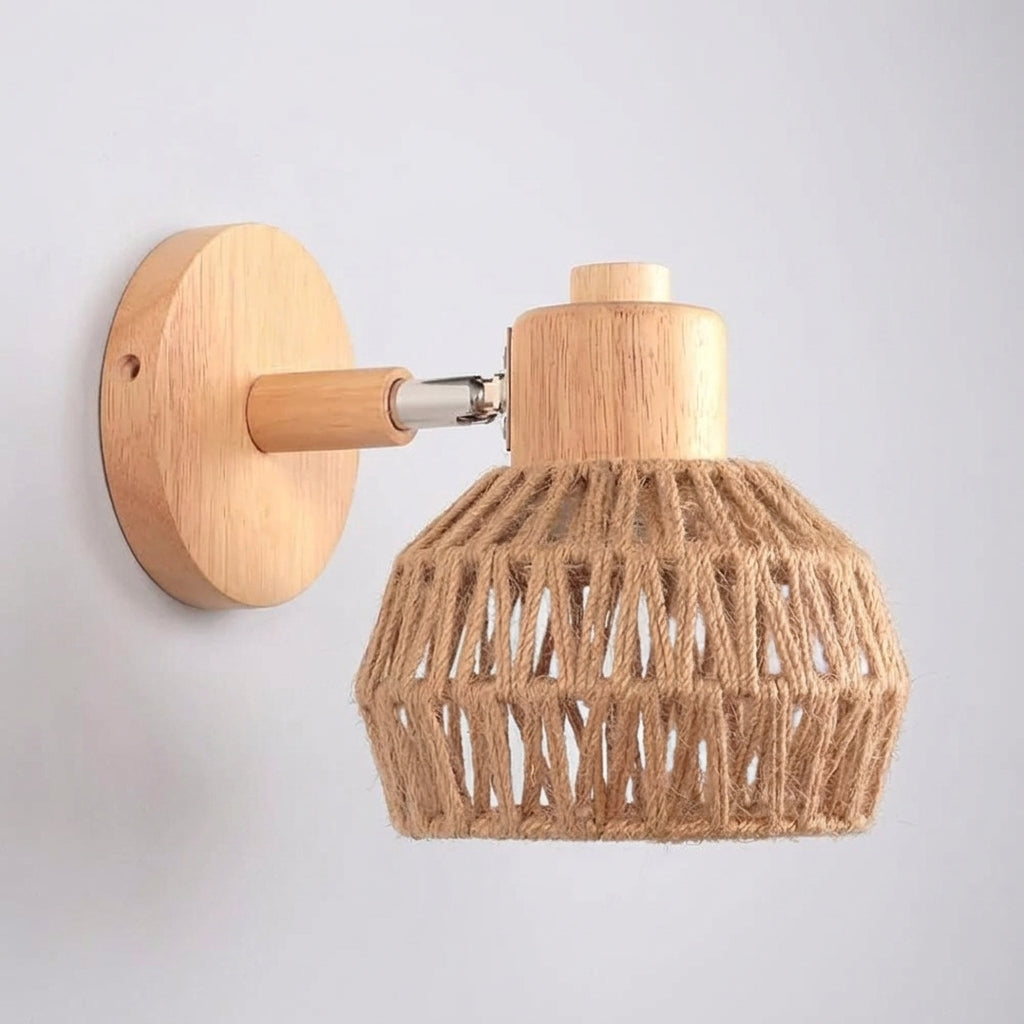 Limzo rattan wall sconce product shot on white background, front view, lit
