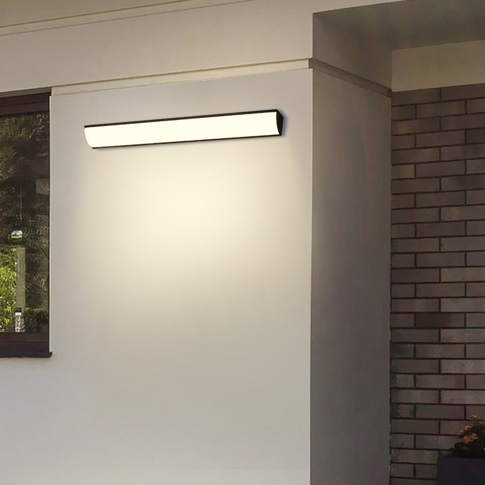 Sleek linear LED exterior light mounted horizontally next to an outdoor window