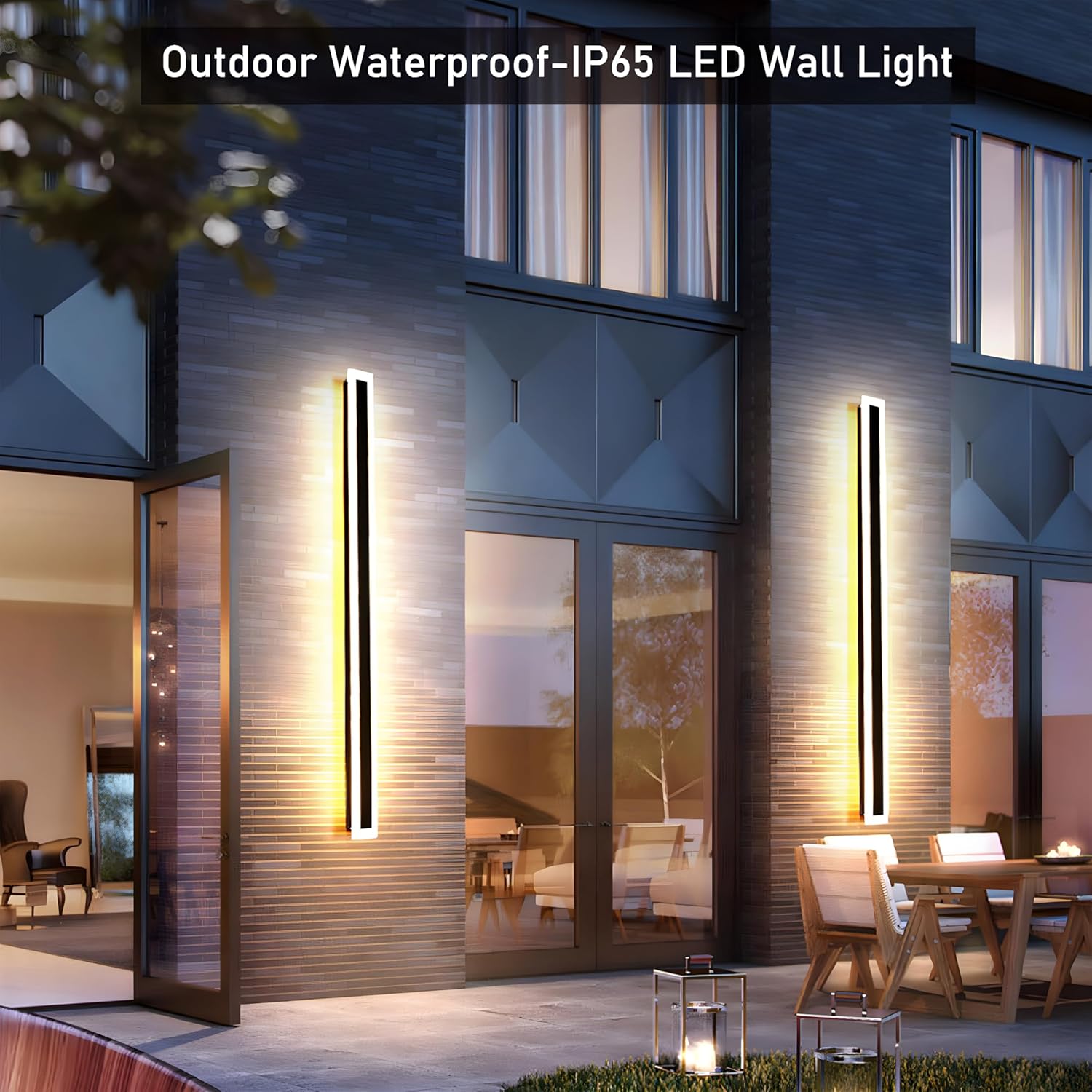 Tall linear LED wall light illuminating a modern outdoor patio area at twilight