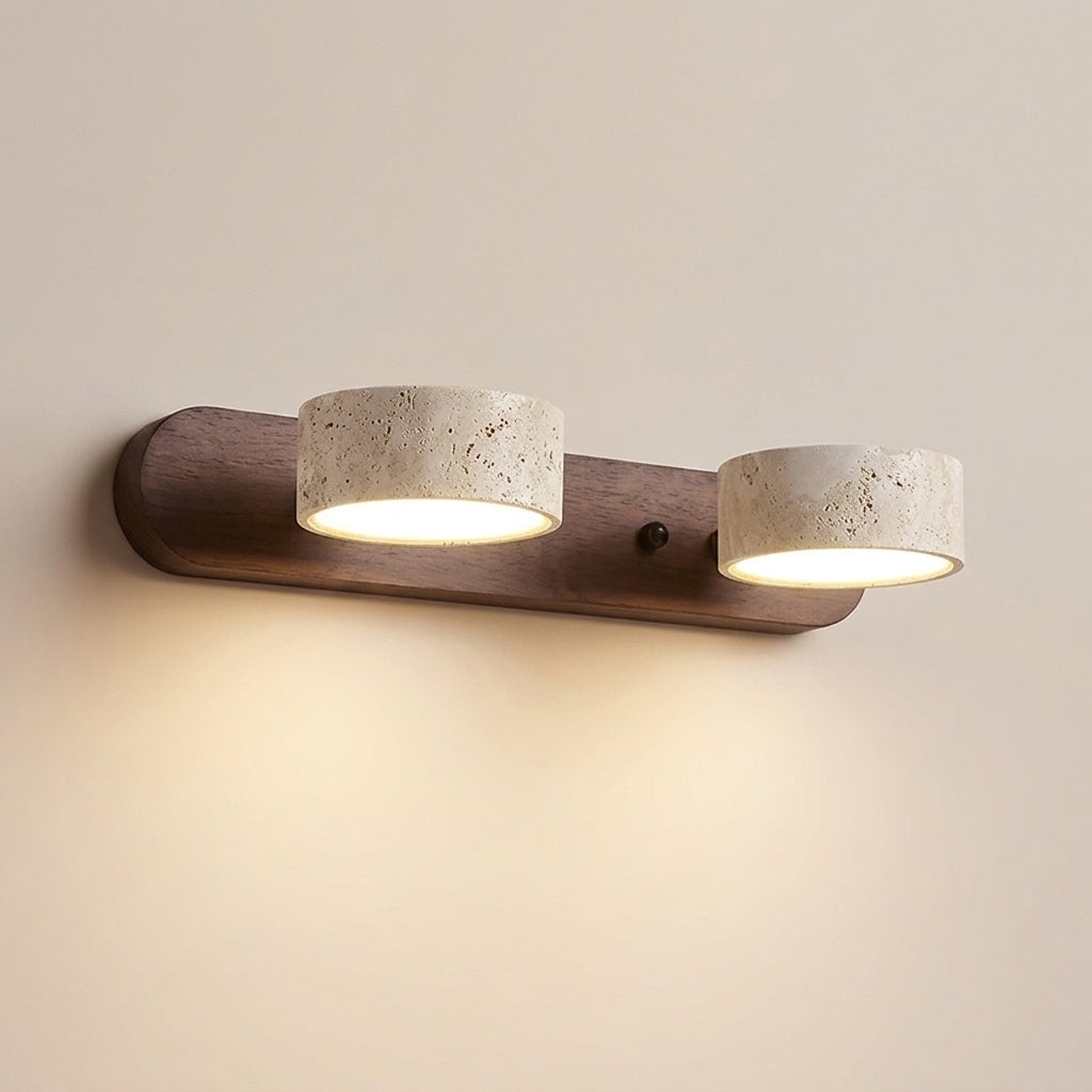 Luvqi 2-head travertine wall light in walnut wood, front view, lit