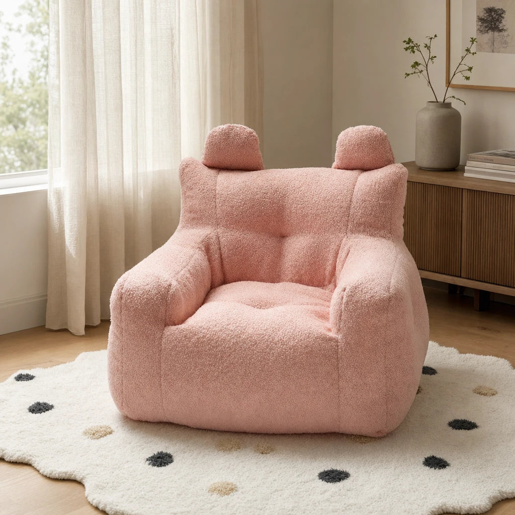 Pink Lambswool Lydel cartoon bear kids bean bag armchair in a modern minimalist room