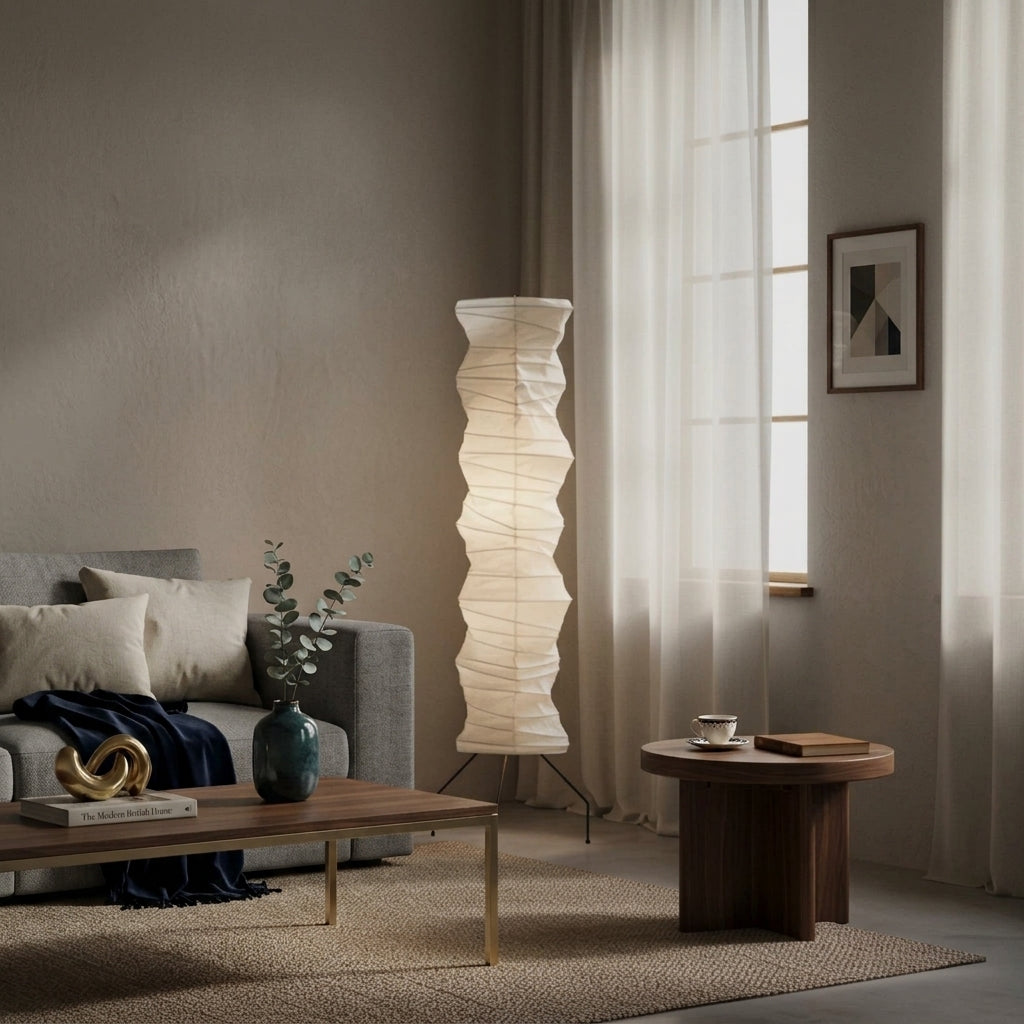 Mepzo floor lamp in a living room corner beside a window, sofa, and coffee table with a vase