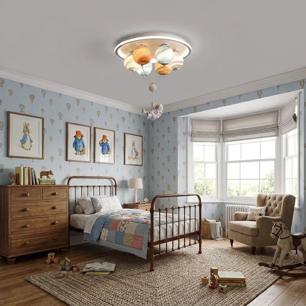 Meqzi astronaut and planet LED ceiling light installed in a kids' bedroom with dresser and wall art
