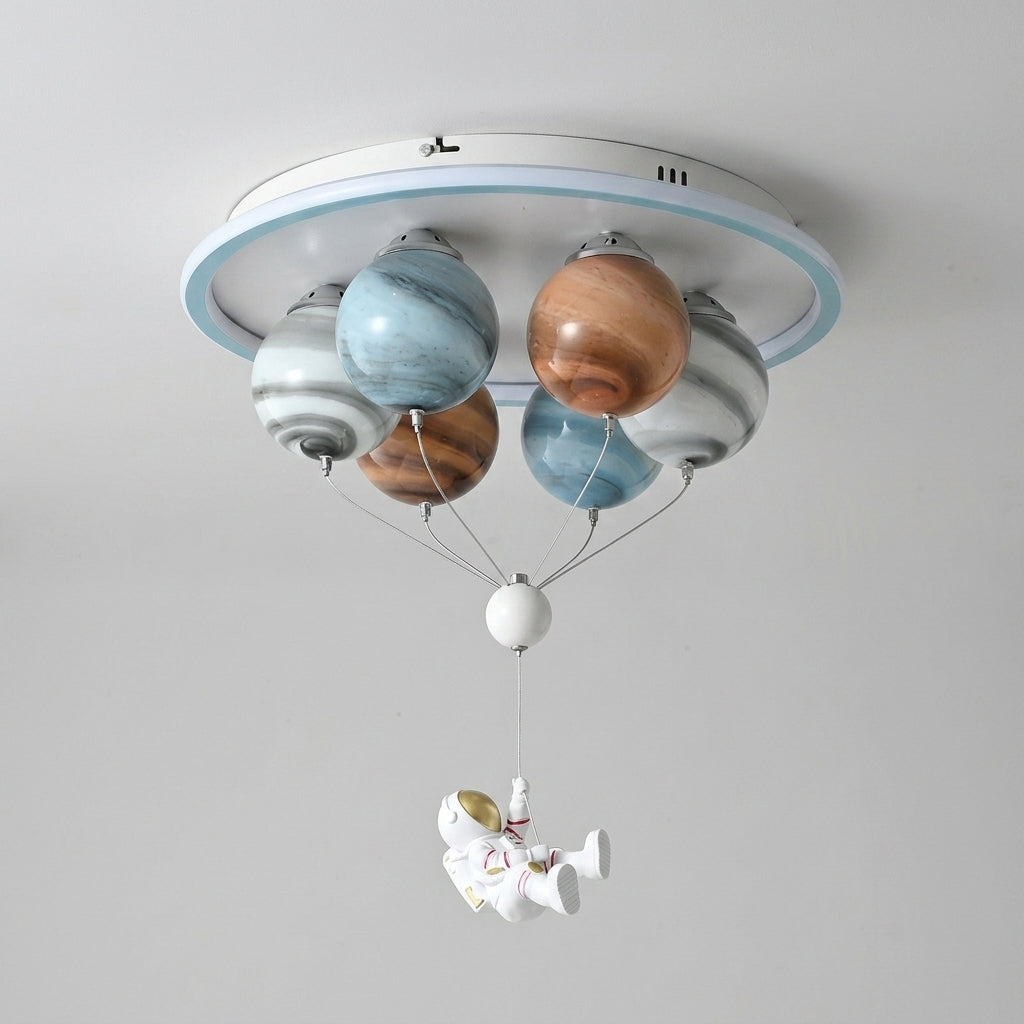 Meqzi astronaut and planet LED ceiling light, front view on grey background