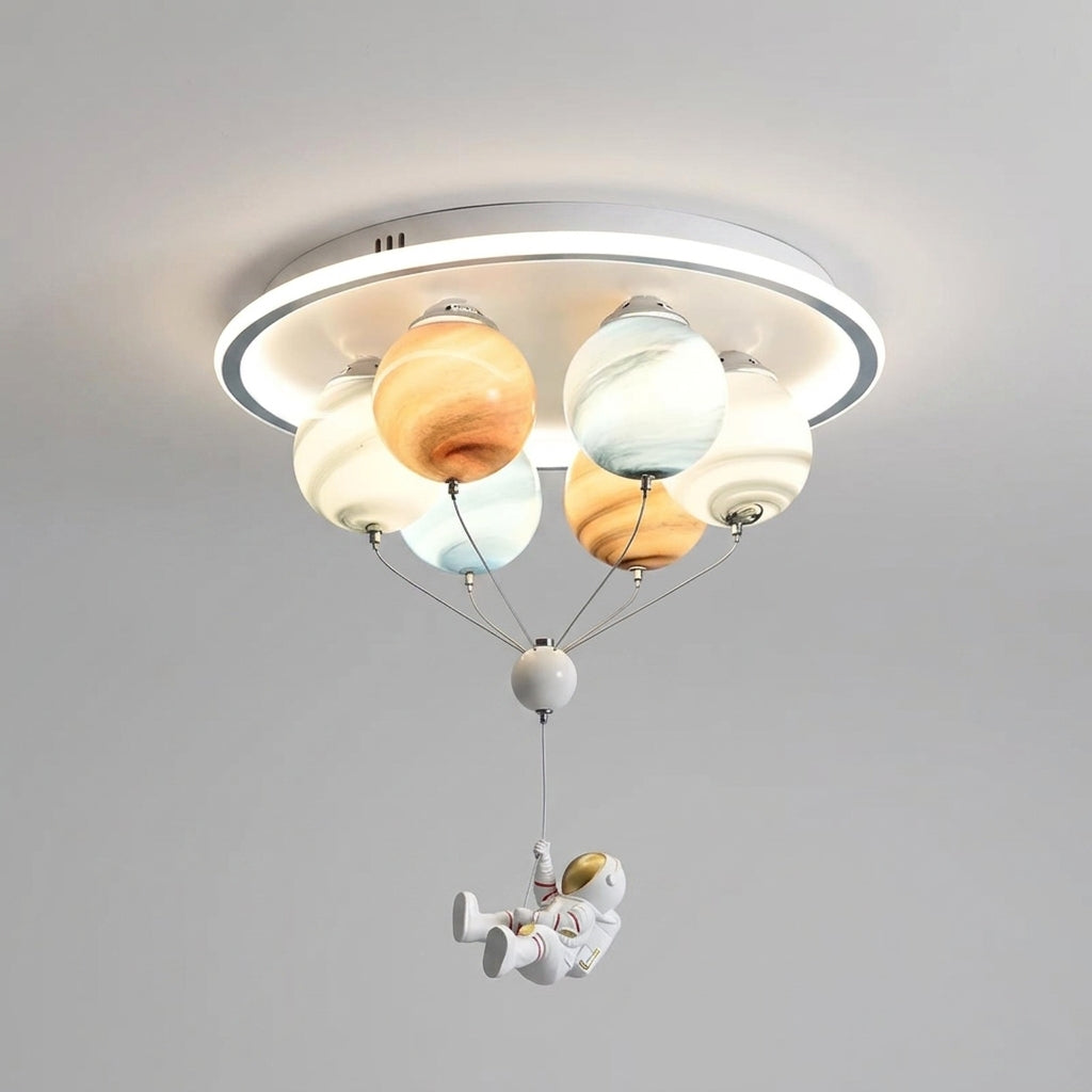 Meqzi astronaut and planet LED ceiling light, hero shot on grey background