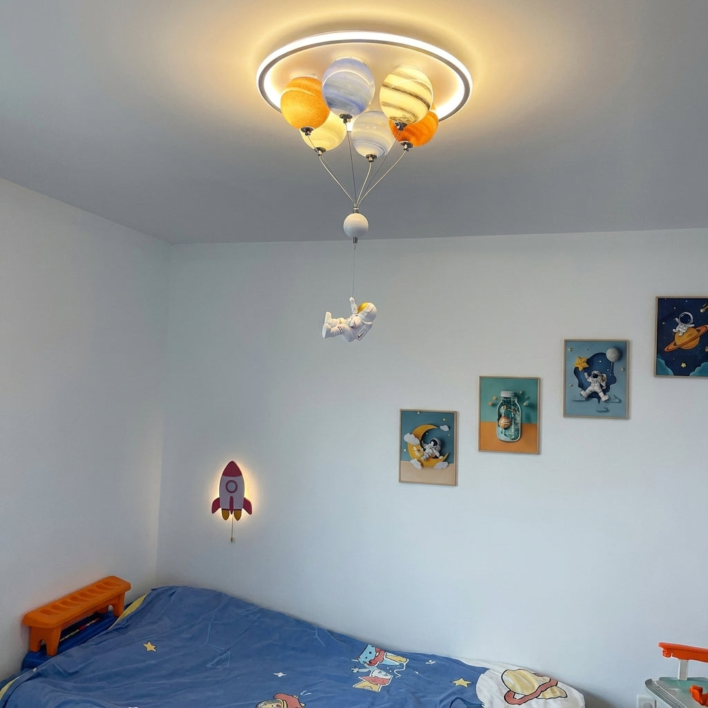 Meqzi astronaut planet LED ceiling light installed in a kids' bedroom with space-themed wall art and a rocket wall lamp
