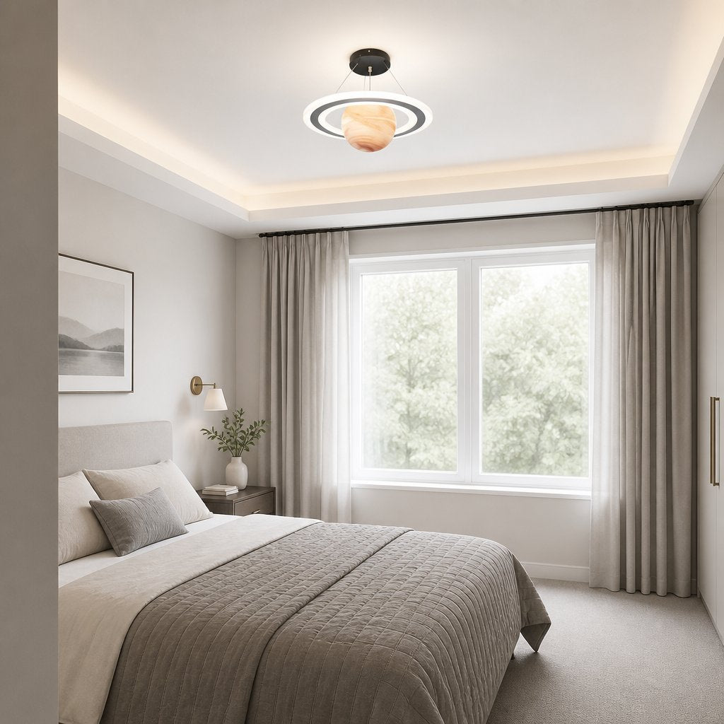 Merven Orange Planet pendant light glowing above a bed beside a large curtained window in a neutral bedroom