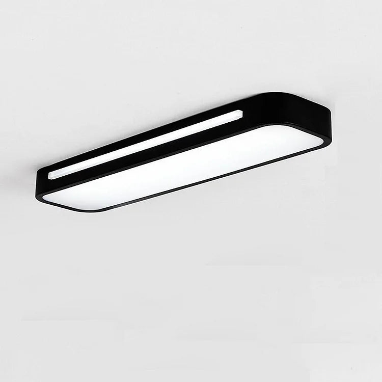 Sleek minimalist black linear flush mount ceiling fixture with rounded edges