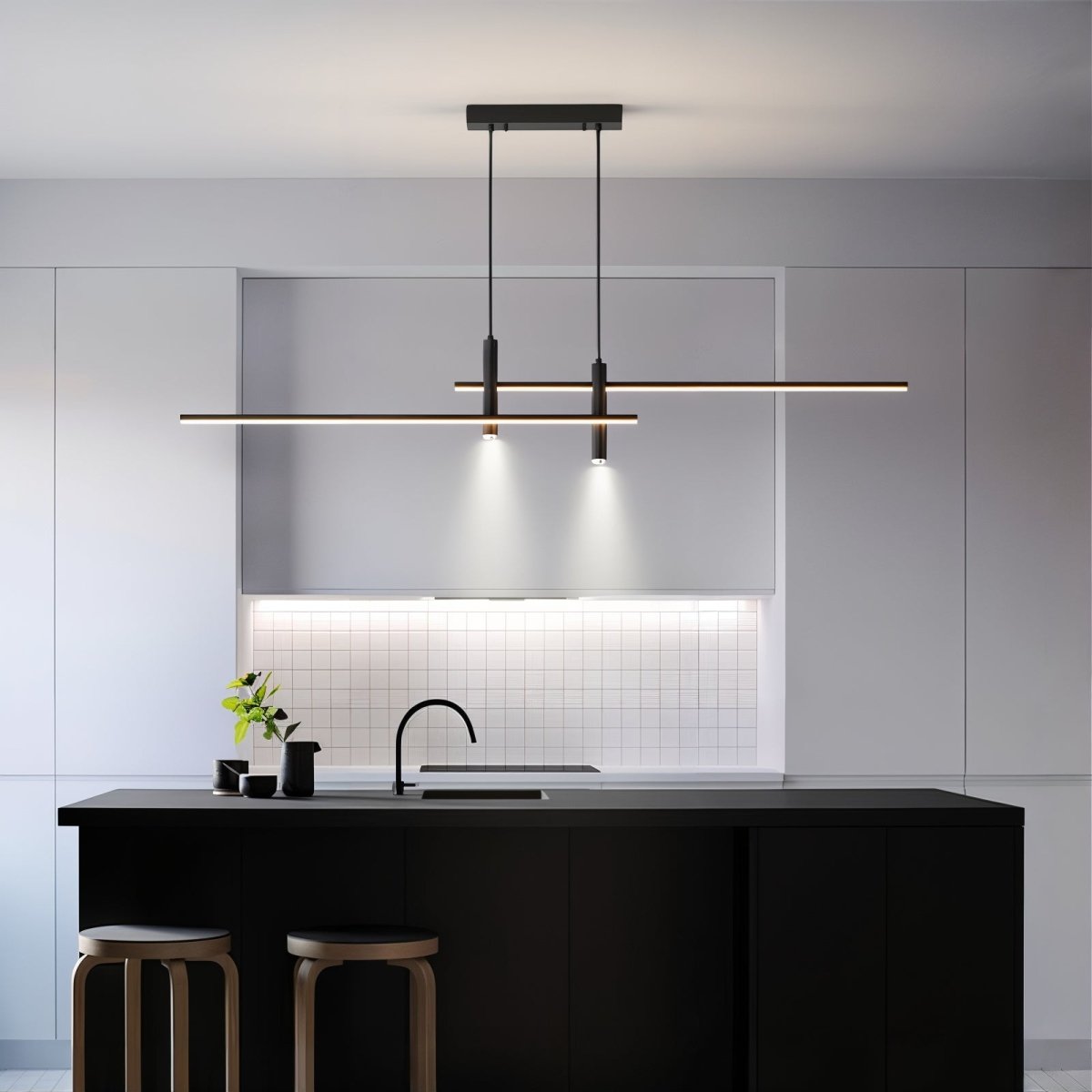 Modern black linear LED pendant providing bright, even illumination over a minimalist white kitchen island.