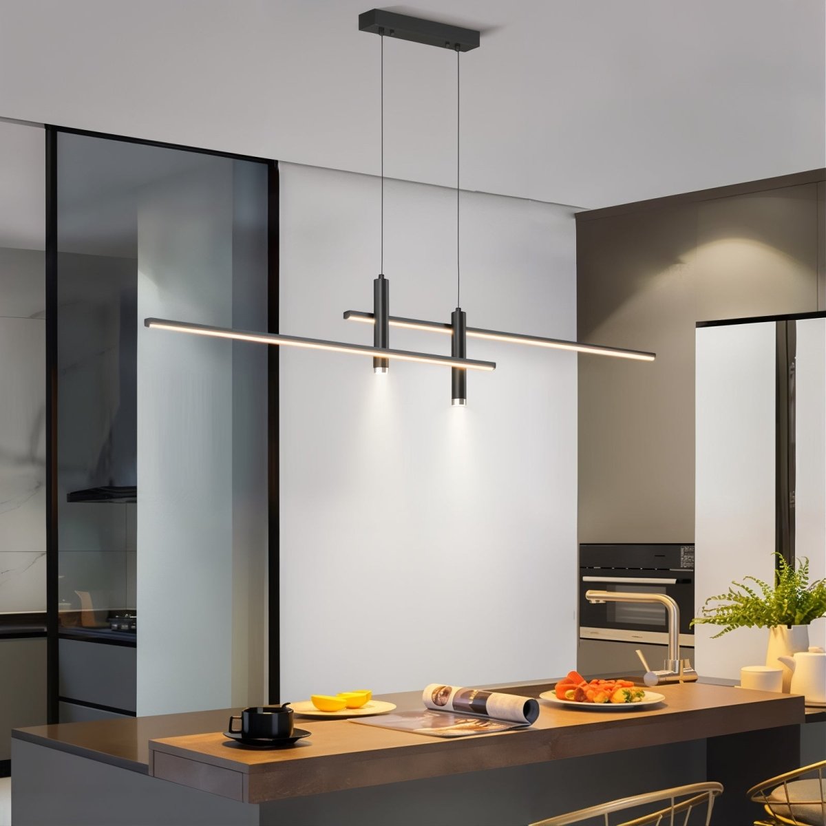 Modern black linear LED pendant providing bright, even illumination over a minimalist white kitchen island
