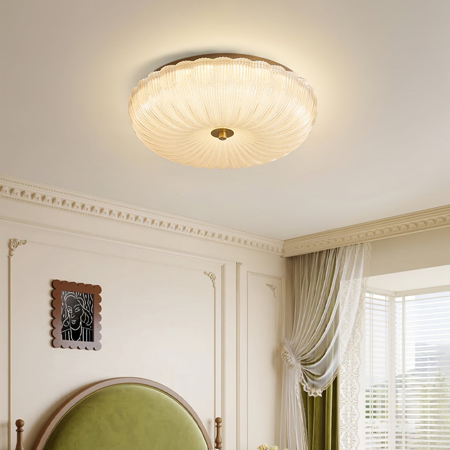 Modern fluted glass flush mount ceiling light in a bright bedroom with an arched doorway