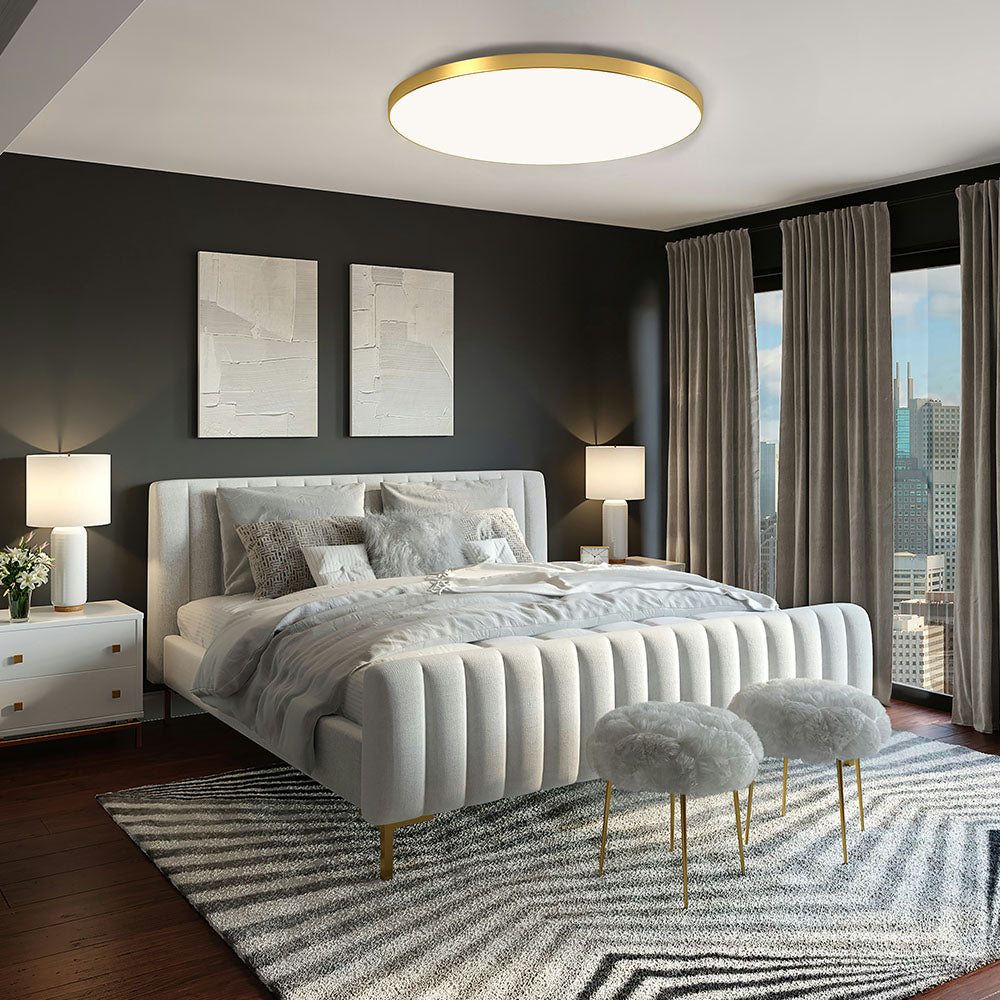 Modern gold LED ceiling lamp installed in a stylish dark-toned bedroom