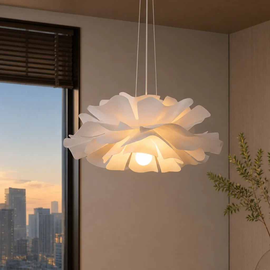 Modern white lotus pendant light illuminating a contemporary city apartment at dusk