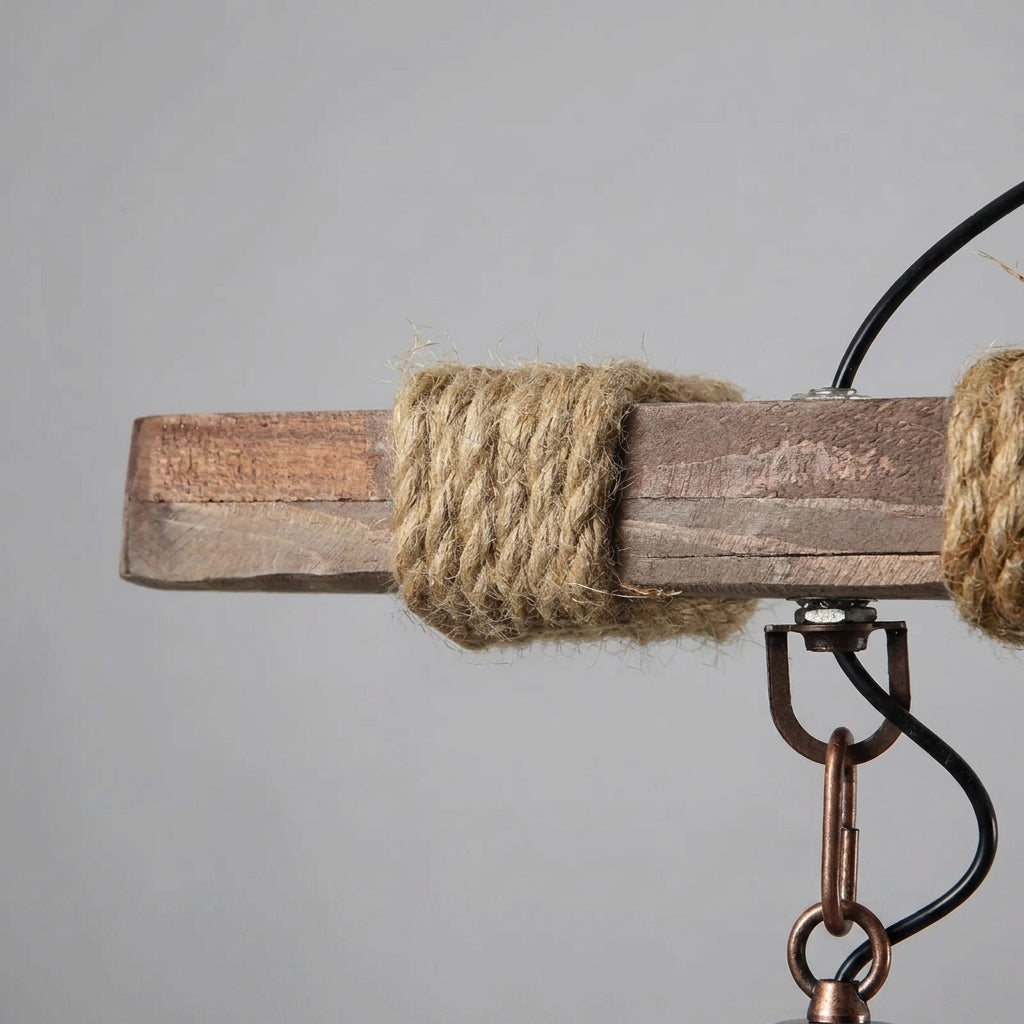 Close-up of the hand-wrapped rope detail at a wood beam joint on the Mupzi chandelier