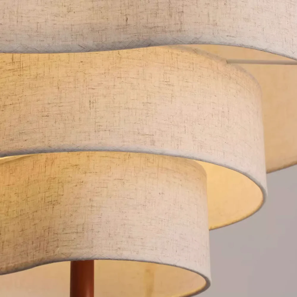 Close-up detail of the premium natural linen fabric texture on the Wabi-Sabi layered chandelier