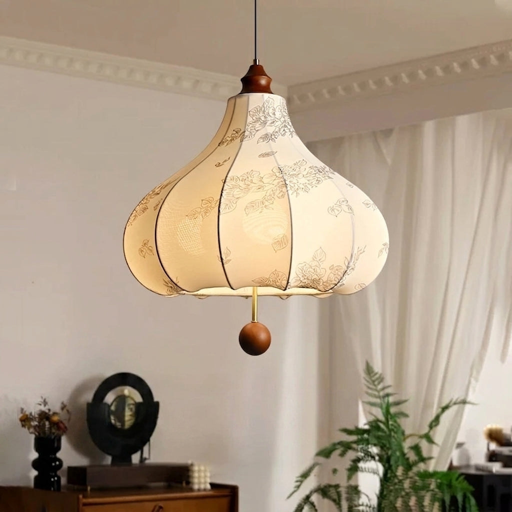 Naxlu pendant light in a living room with sheer curtains