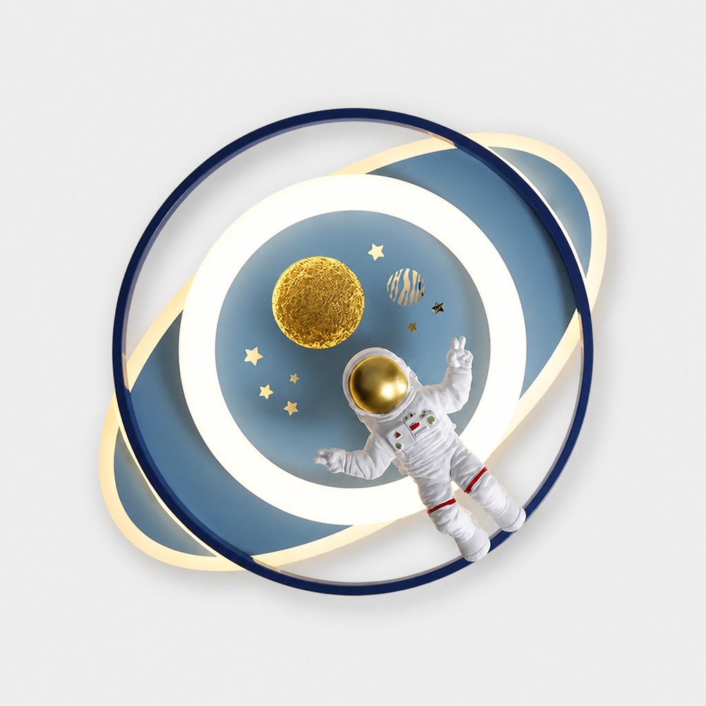 Close-up studio shot of the Neston astronaut ceiling light showing the ring, gold planet and astronaut figure