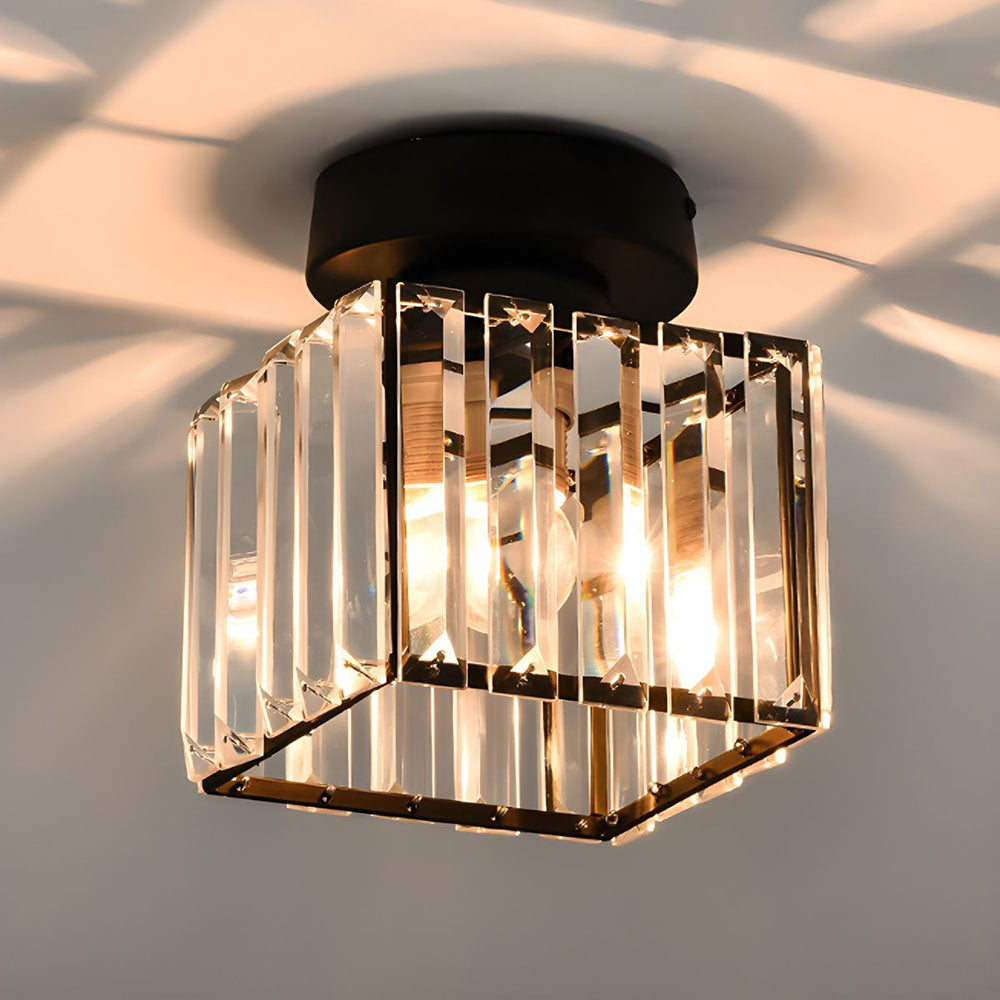 Close-up of a glowing black square crystal flush mount netyf ceiling light casting light reflections
