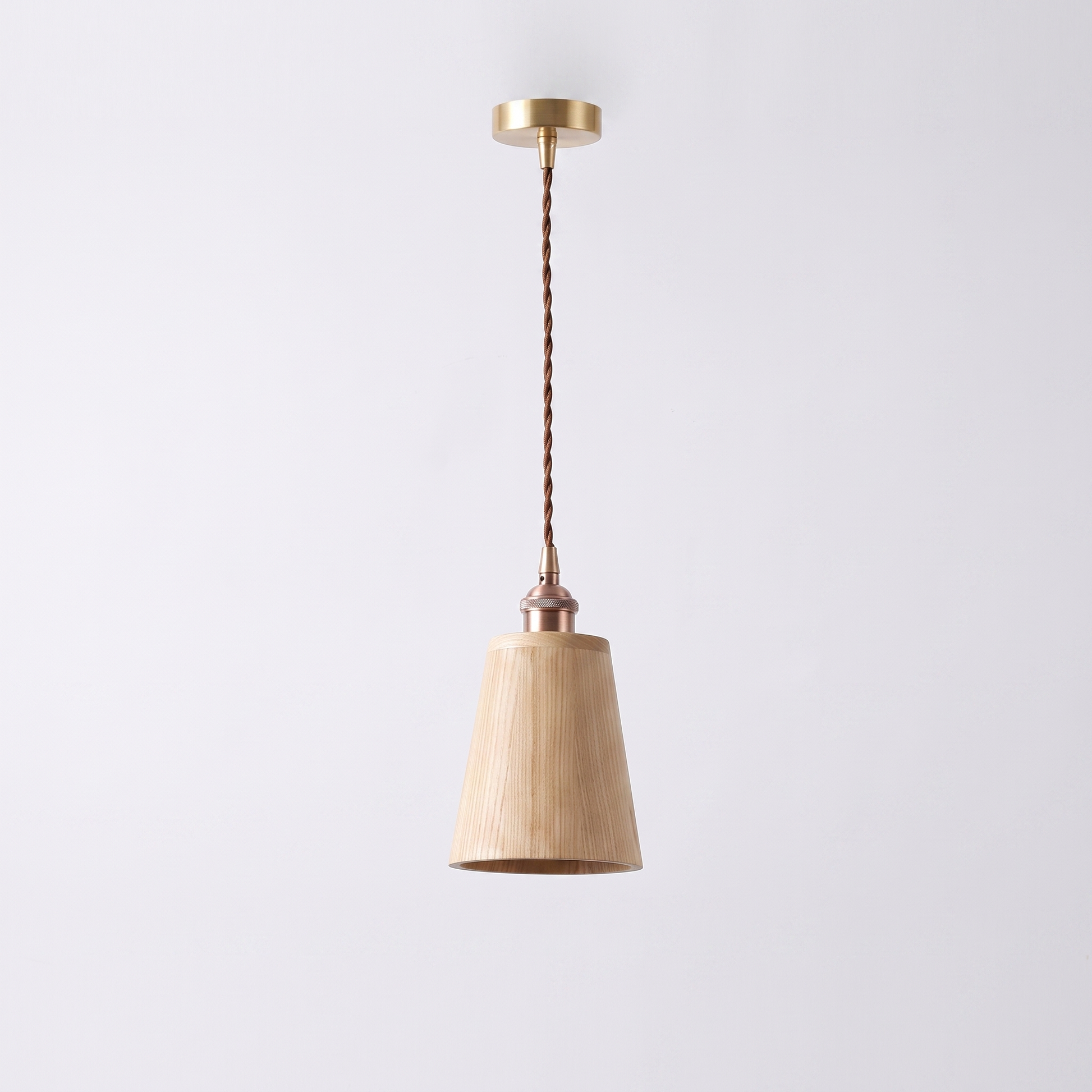 Oqzi minimalist wood and copper pendant light, Ash Wood Cone style, hero shot on grey background