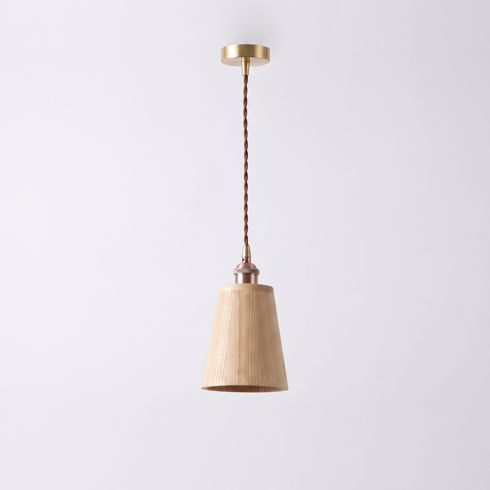 Oqzi minimalist wood and copper pendant light, Ash Wood Cone style, hero shot on grey background