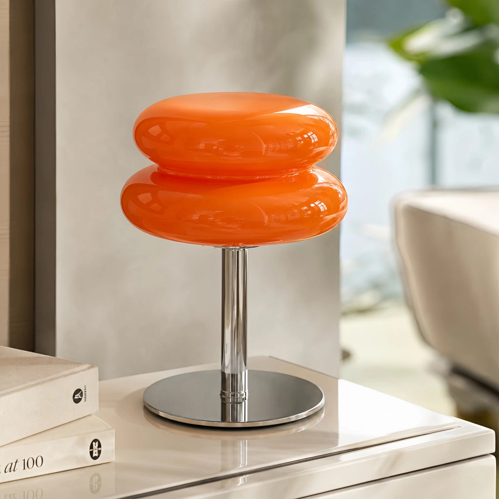 Orange retro glass table lamp used as elegant ambient bedside lighting