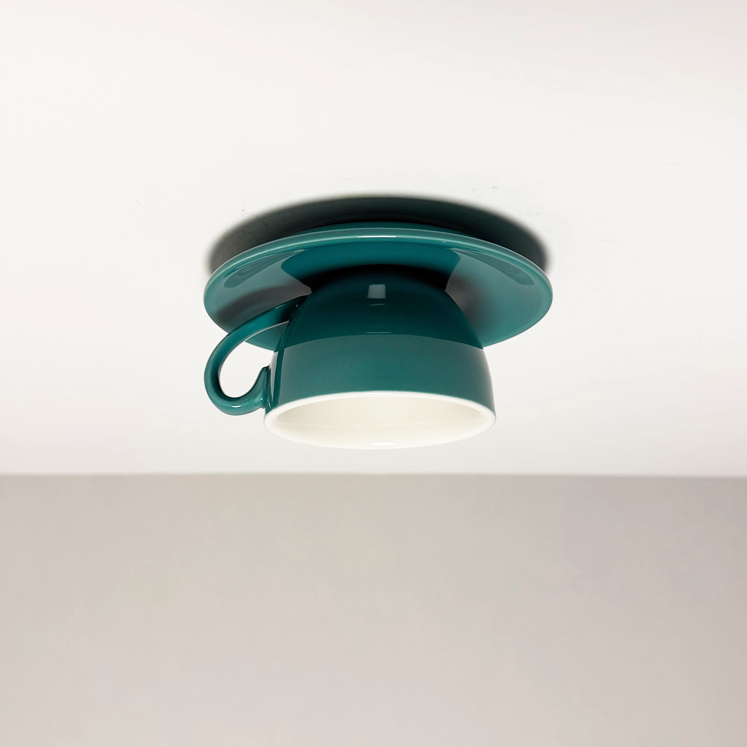 Peacock green novelty coffee cup ceiling lamp with a glossy ceramic finish