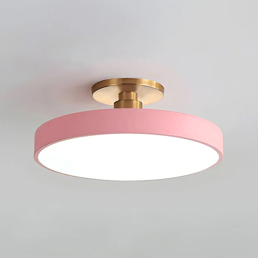 Soft pink macaron drum ceiling light highlighting its smooth, matte finish
