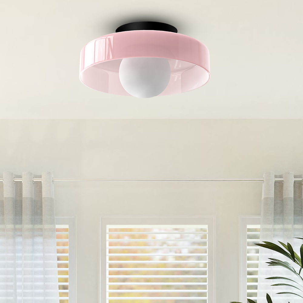 Soft pink macaron glass ceiling light adding a pastel touch to a bright room