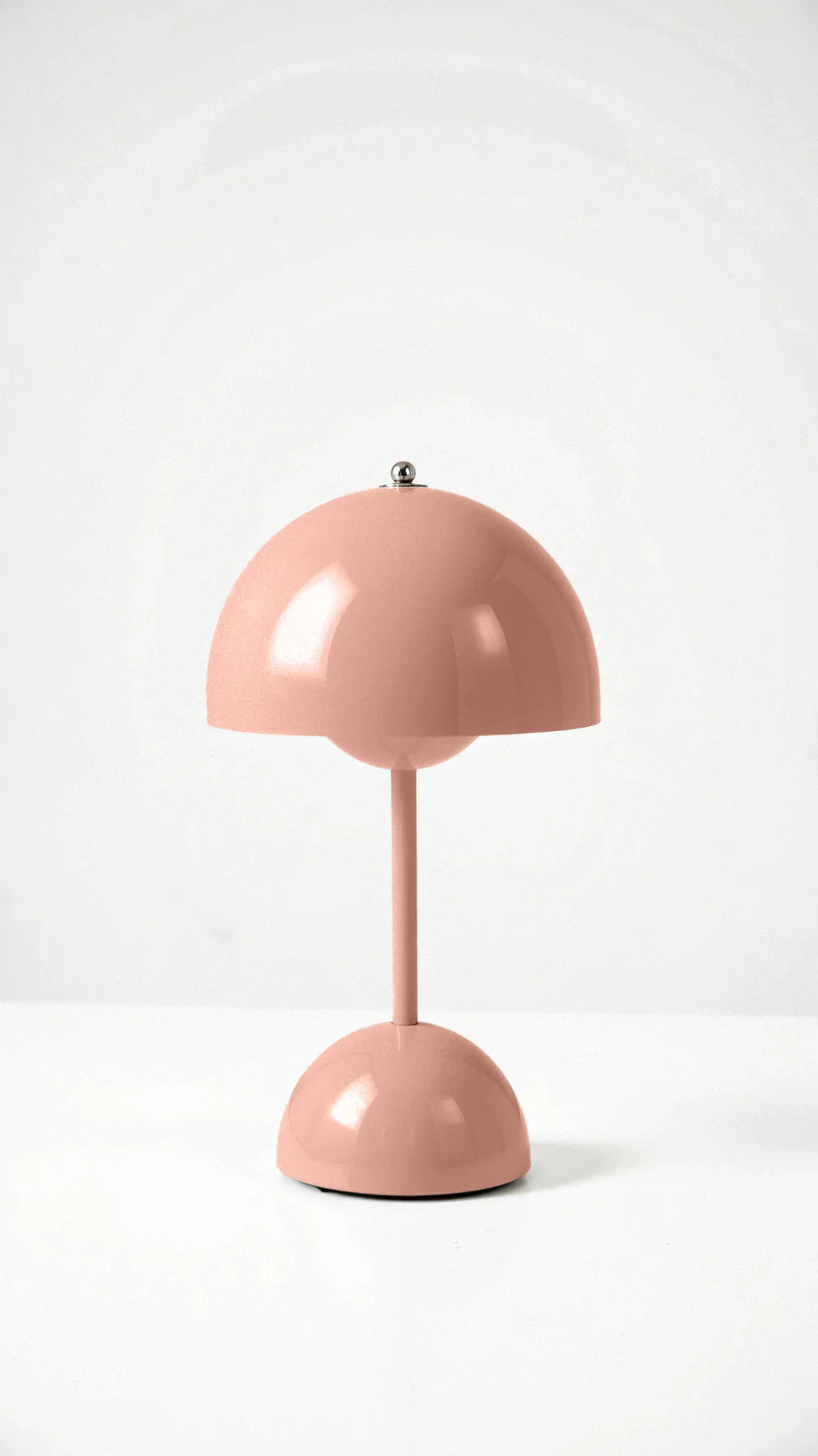 pink rechargeable dome accent light isolated on white