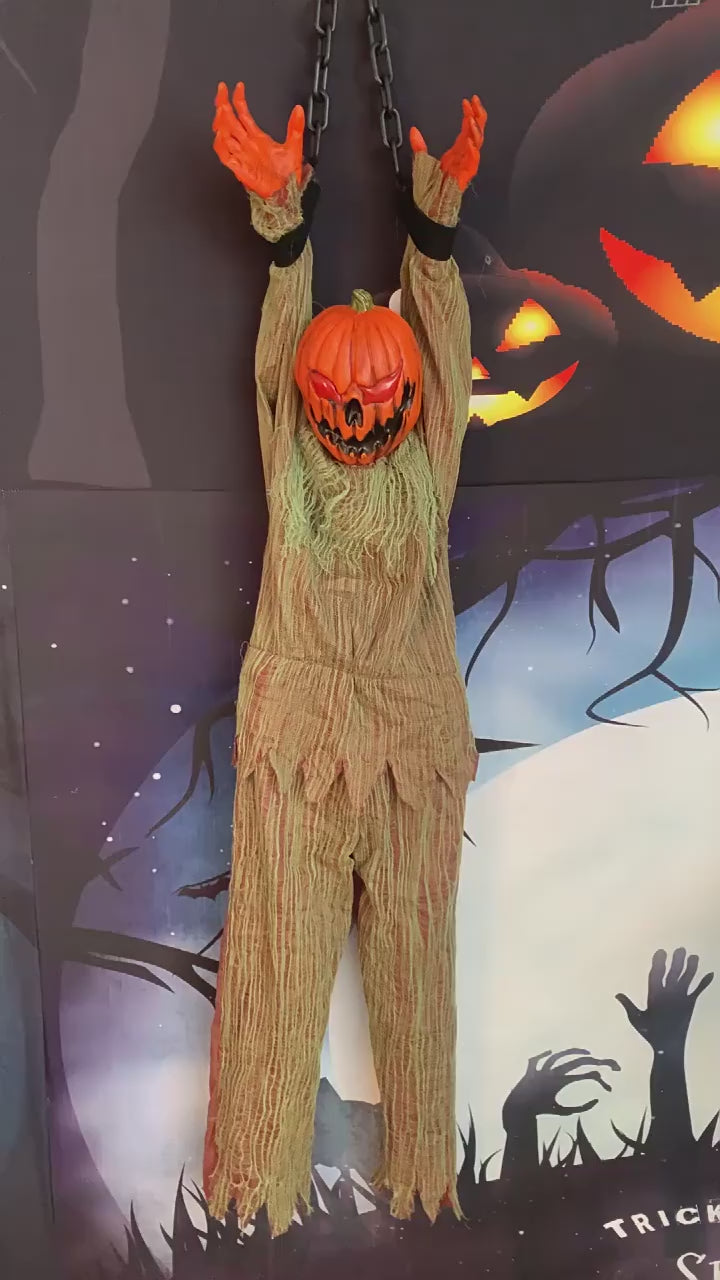 Load video: Gigglefiend hanging Halloween prop demo video showing light-up eyes and sound effects