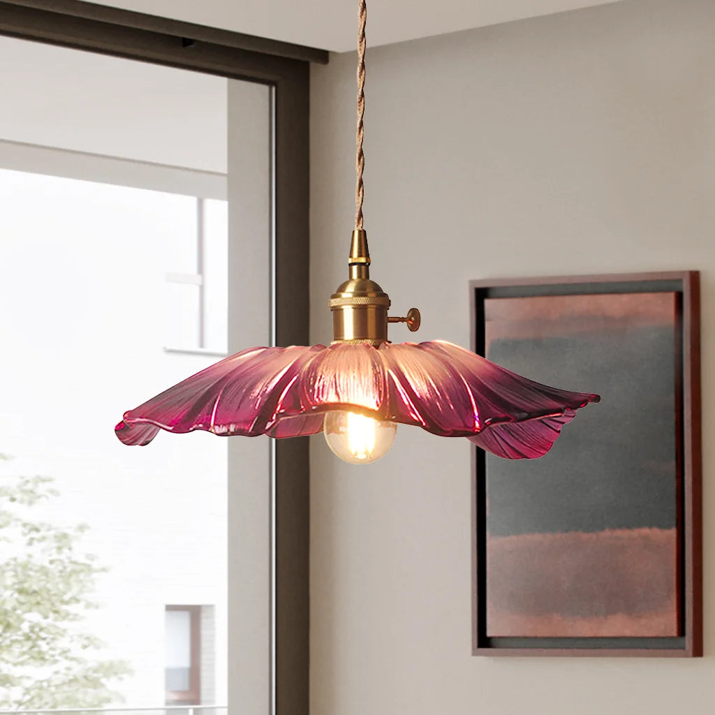 Purple lotus glass pendant styled in a modern, naturally lit interior space