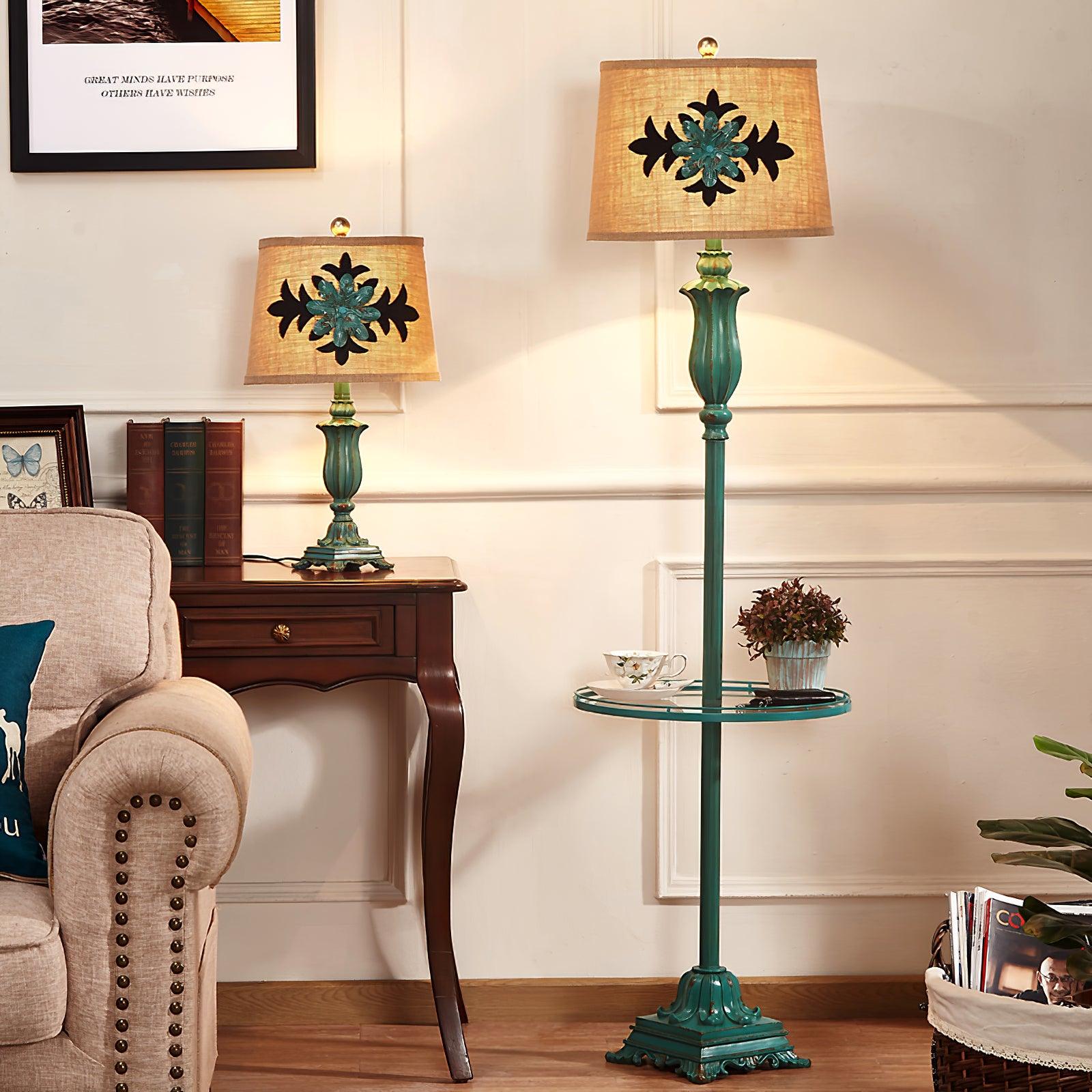 Green puska floor lamp with a built-in table and patterned fabric shade in a warm, traditional lounge setting