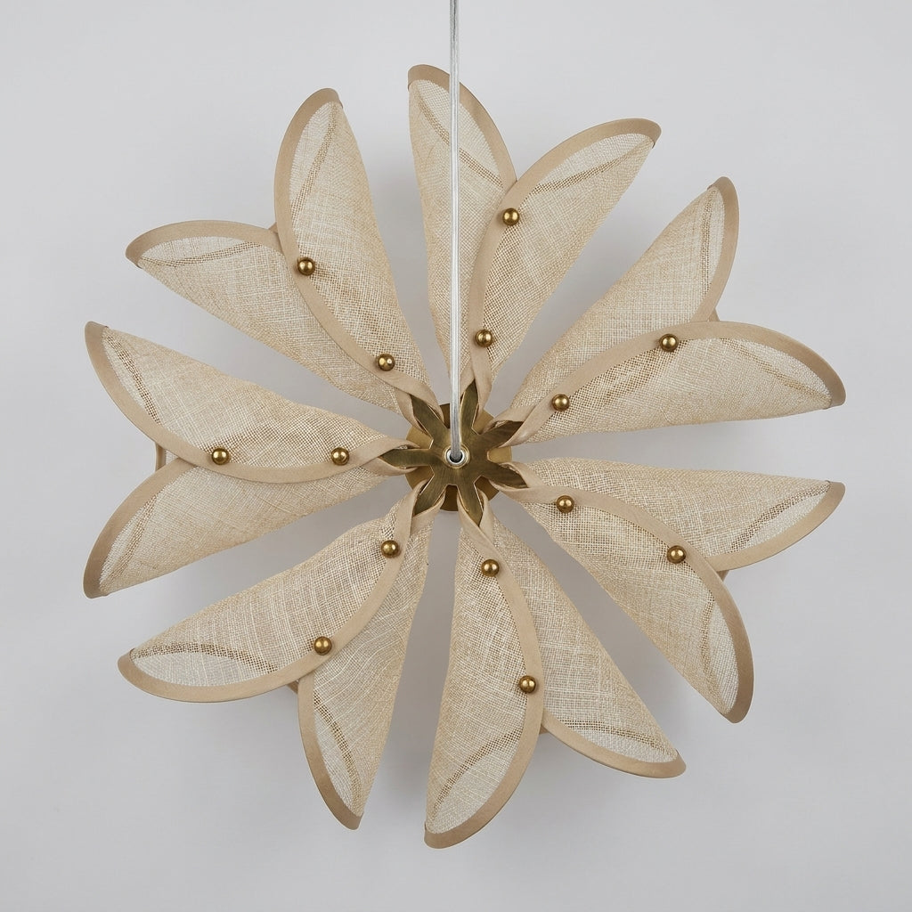Top-down view of the Puvzo woven rattan lotus pendant light shade, unlit, on a plain background