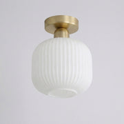 Qavlu ribbed glass semi-flush ceiling light with brushed gold canopy, lantern shape, on white background