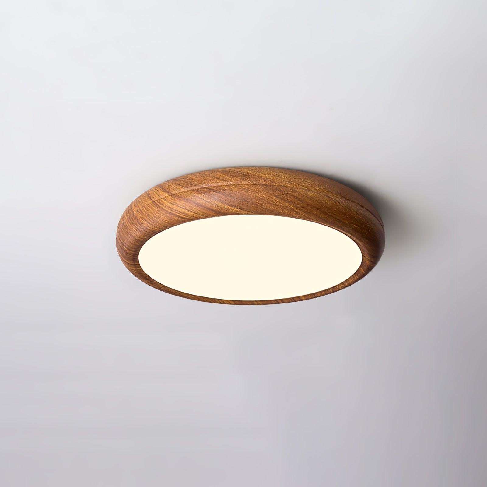 Modern walnut wood-effect round LED qexi ceiling light with a curved profile