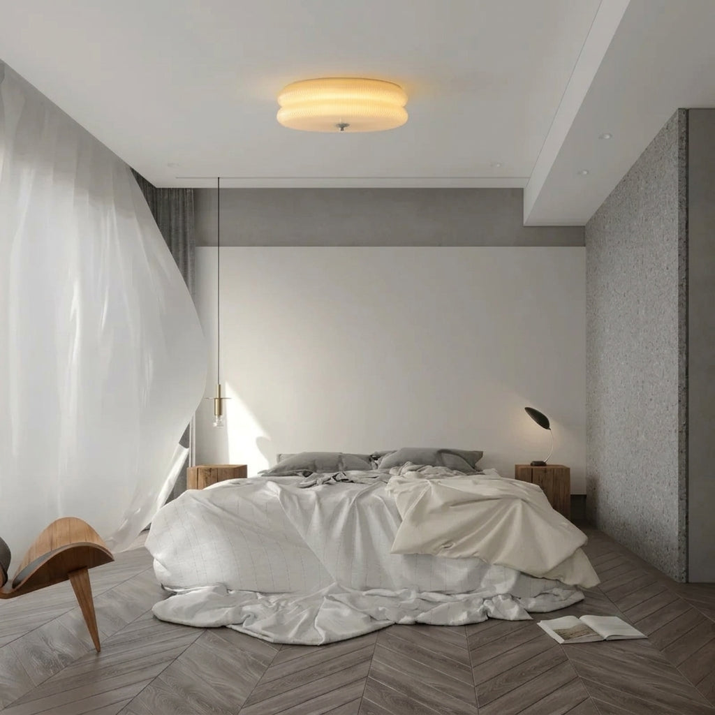 Qoxli tiered ceiling light lit warm white above a bed in a dimly lit bedroom