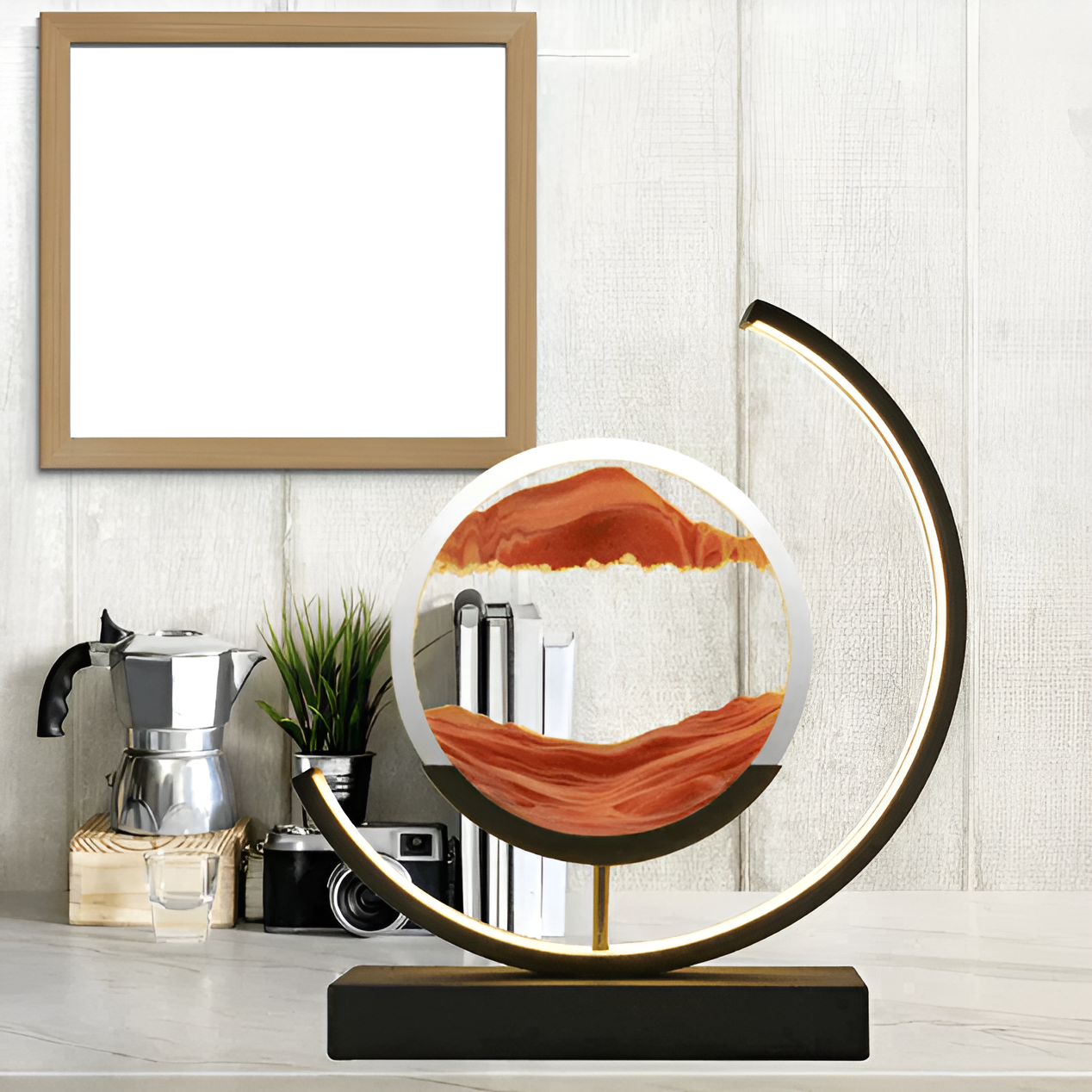 Rechargeable moving sand art lamp acting as calming shelf decor in a bright modern room