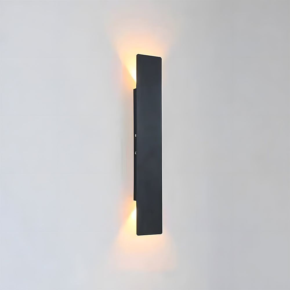 Side profile of the glowing slim reta black up and down wall lamp