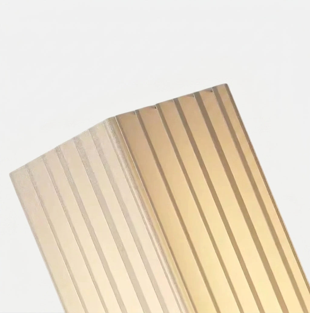 Close-up of the Ruxpa lamp's folded pleated fabric shade material, unlit
