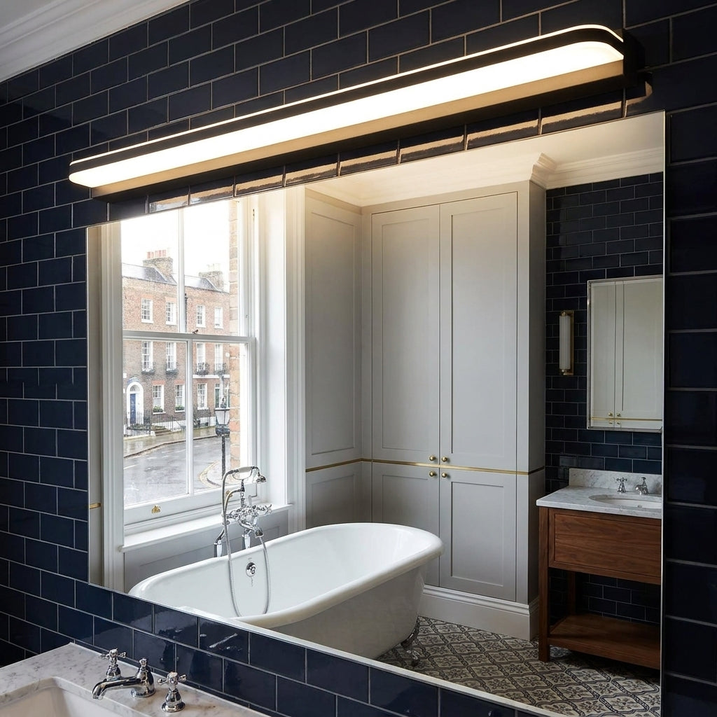 Rymza LED mirror light installed above a bathroom vanity