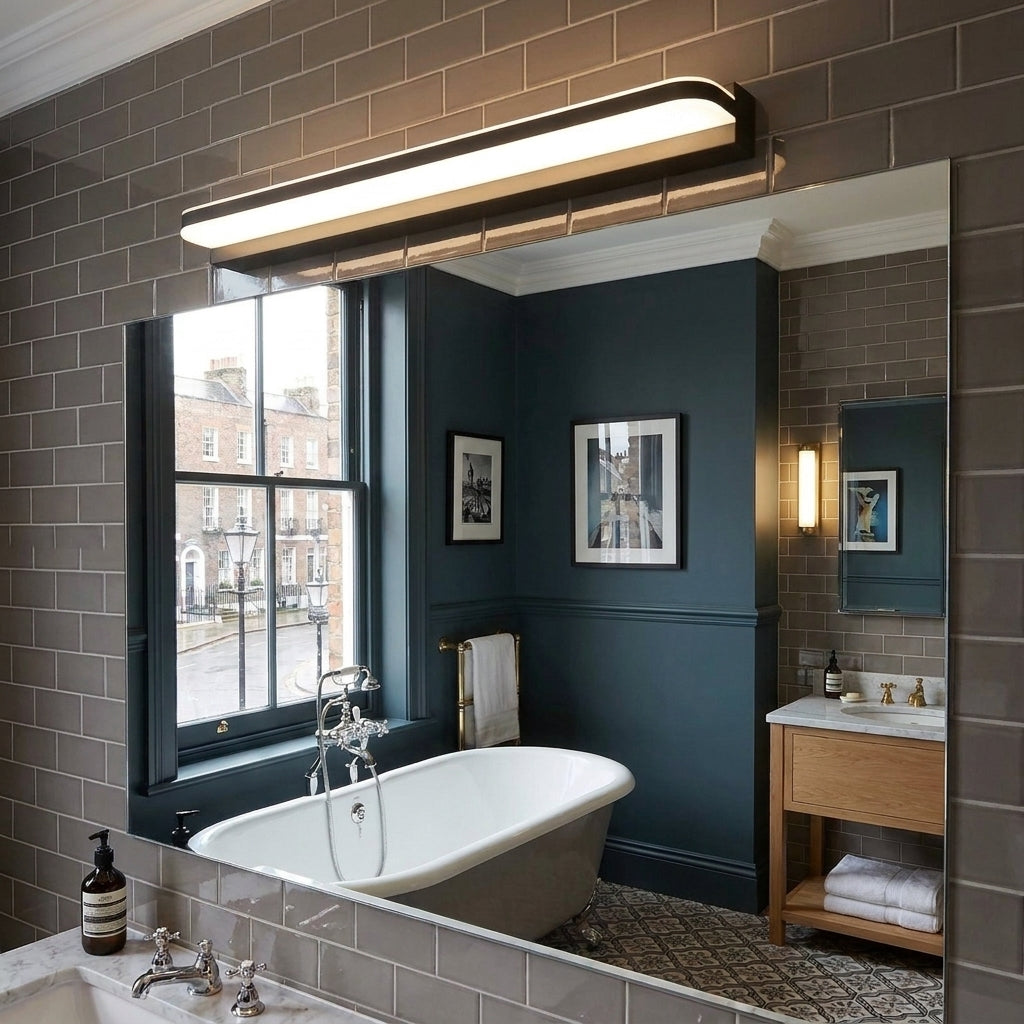 Rymza LED mirror light installed above a bathroom vanity