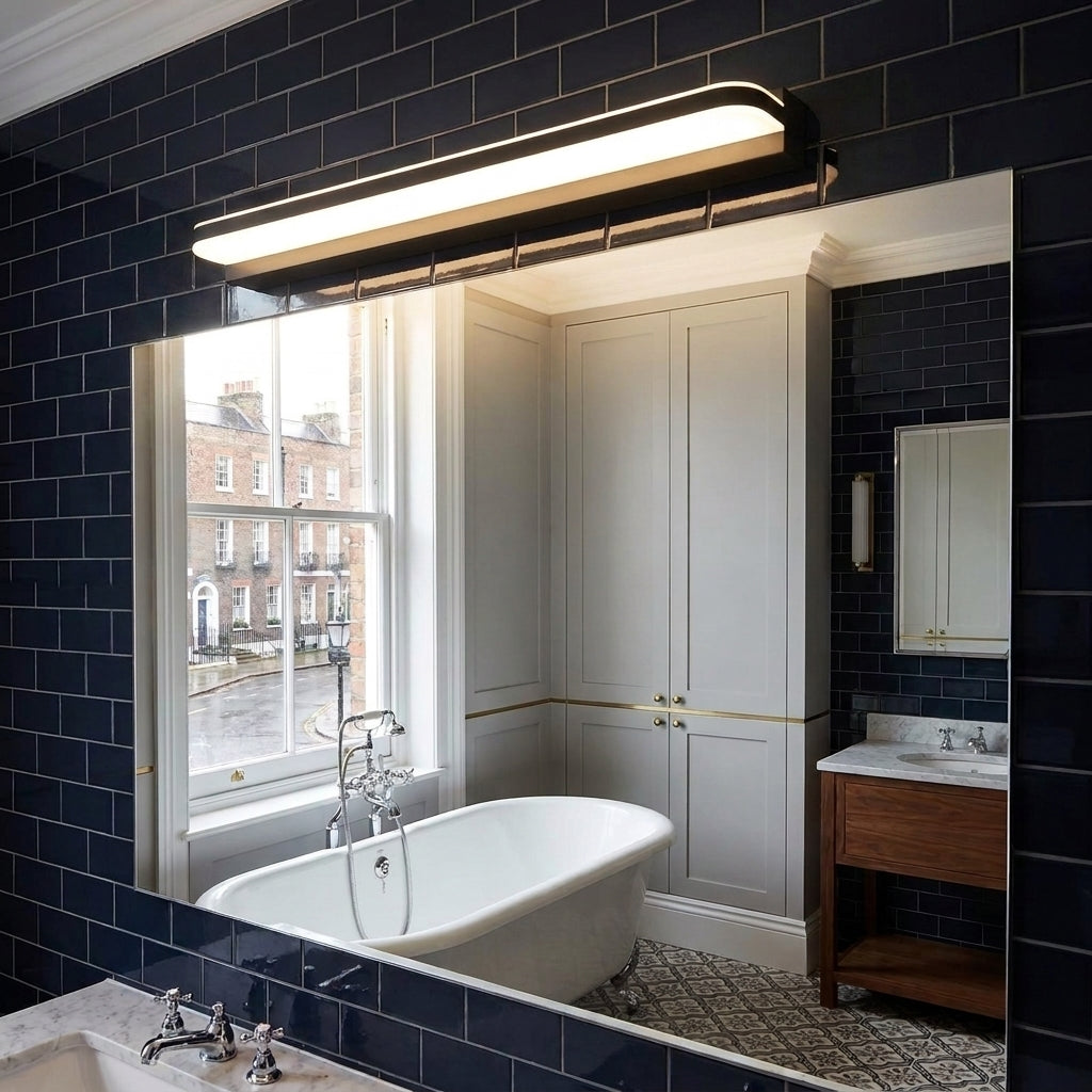 Rymza LED mirror light installed above a bathroom vanity