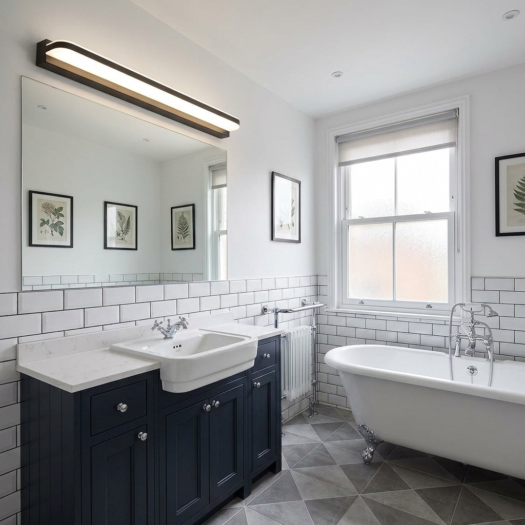 Rymza LED mirror light installed above a bathroom vanity